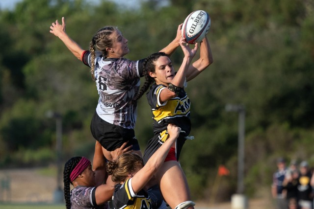 Army 1st Lt. Cienna Jordan, right, and Air Force Capt. Katie Mueller battle for a ball during the 2024-Armed Forces Women’s Rugby Championships held in conjunction with the San Diego Surfers Women’s Rugby Club 7’s Tournament in San Diego,...