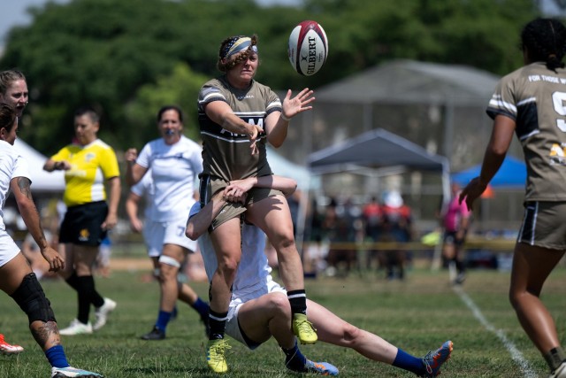 Army Staff Sgt. Erica Myers passes the footie during the 2024 Armed Forces Women’s Rugby Championships in San Diego, Calif. July 12, 2024. (DoD photo by EJ Hersom)