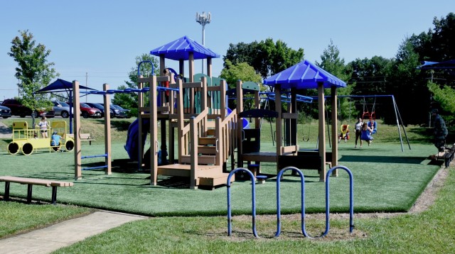 Military chidren enjoy the new inclusive playground July 18 on Fort Knox, Kentucky. It includes specialized turf, swing and interactive games. (U.S. Army photo by Shannon Collins)