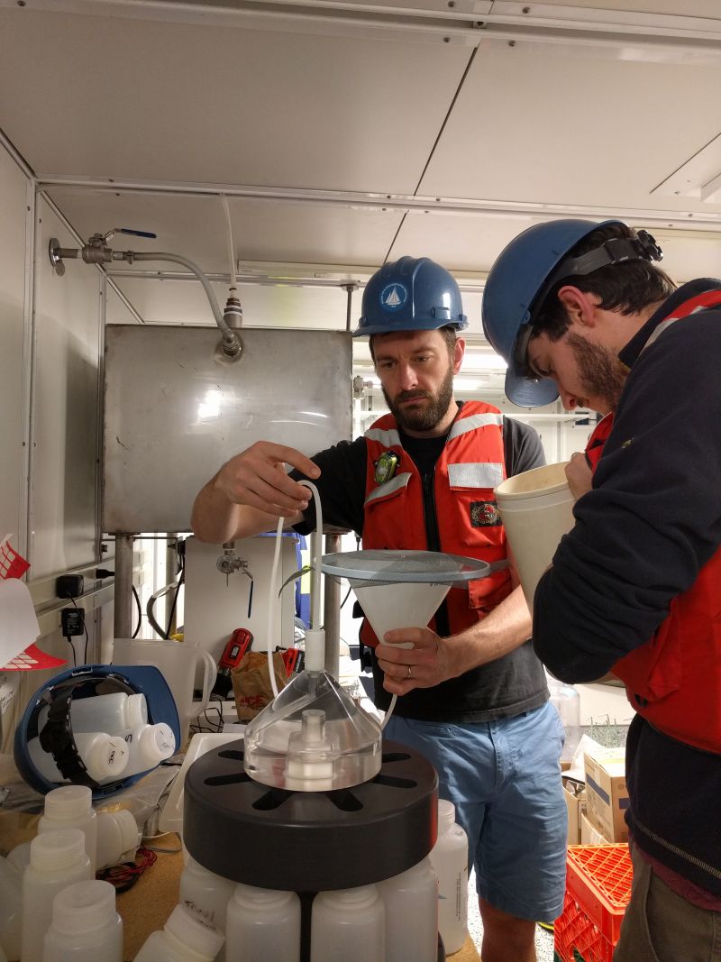 two men working in lab