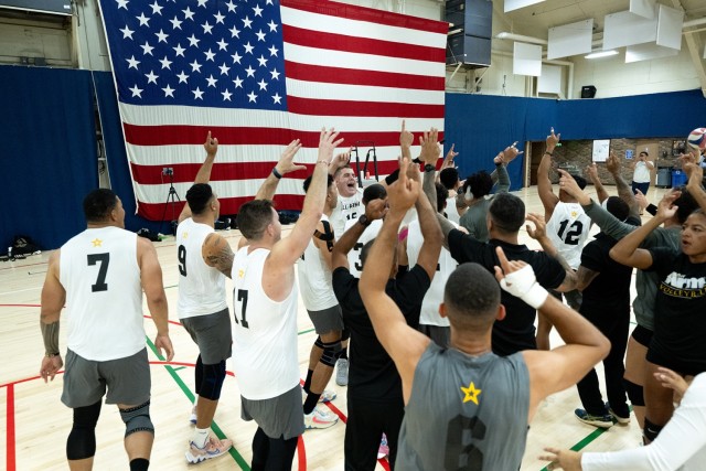 Members of the All-Army men's volleyball team celebrate their 3-1 win over the All-Air Force Team on Sept. 12, 2024 at Fort Carson, Co.