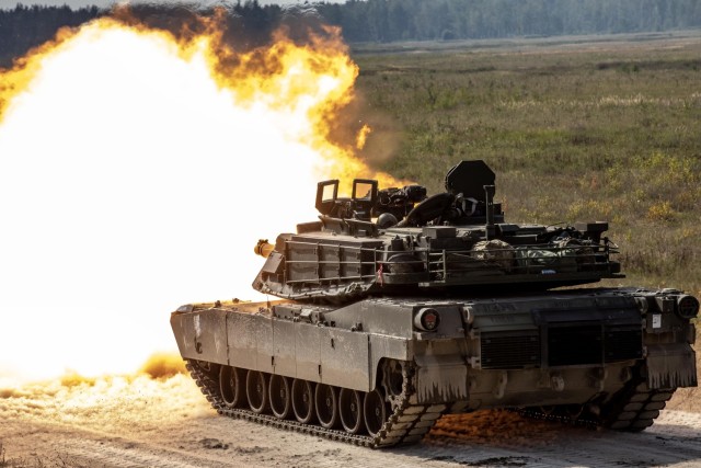 U.S. Army tank crews with Alpha “Animal” Company and Bravo “Barbarian” Company, 2nd Battalion, 69th Armor Regiment, 2nd Armored Brigade Combat Team, supporting 3rd Infantry Division, fire rounds from M1A2 Abrams tanks at Bemowo Piskie...