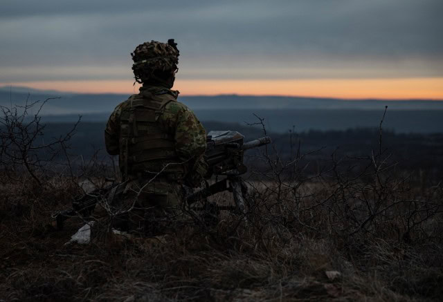 A Soldier assigned to the 39th Brigade Engineer Battalion, 2nd Brigade Combat Team, 101st Airborne Division (Air Assault), pulls security during Exercise Bull Fury on Jan. 16, 2023, in Romania. 101st units will support V Corps mission to reinforce...