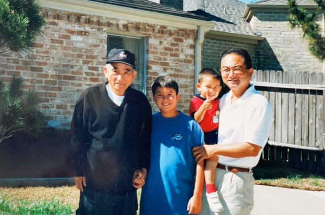 The Shigeru family, from left to right: the late World War II veteran G. Shigeru Higashioka; now San Diego Padres pitcher, Kyle; Kyle's brother; and father Ted.