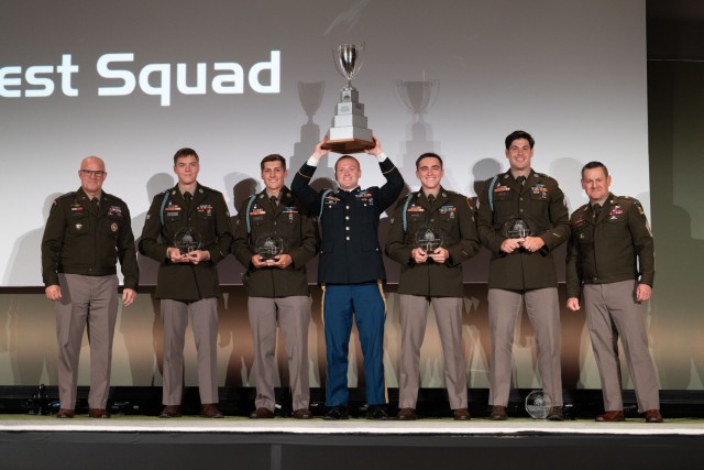 Army Vice Chief of Staff Gen. James J. Mingus and Sgt. Maj. of the Army Michael R. Weimer present the Best Squad of the Year Award to U.S. Army Pacific's 25th Infantry Division during the Association of the U.S. Army Annual Meeting and...