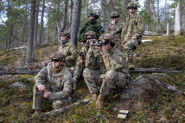 U.S. Army Soldiers assigned to the 3rd Brigade Combat Team, 10th Mountain Division at Fort Johnson, Louisiana, watch an artillery demonstration during exercise Defender Europe 2024 near Rovaniemi, Finland, May 17, 2024. Defender Europe is the...