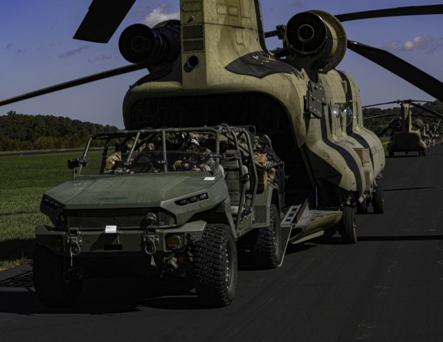 Soldiers assigned to the Combat Aviation Brigade, 101st Airborne Division (Air Assault) Combat Aviation unload an Infantry Squad Vehicle from a CH-47 Chinook in Greenville, Tennessee, Oct. 7, 2024. The Soldiers are supporting Hurricane Helen...