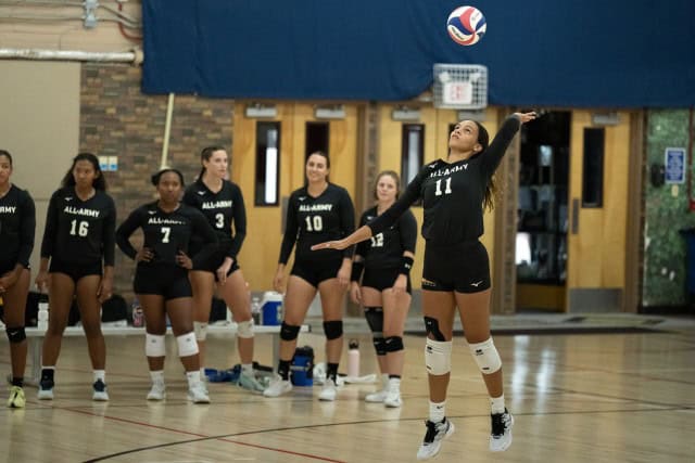 Spc. Julymar Otero prepares to unleash a serve during the 2024 Armed Forces women's volleyball tournament at Fort Carson, Colorado. Otero helped the Army win its first Armed Forces Volleyball title since 2015.