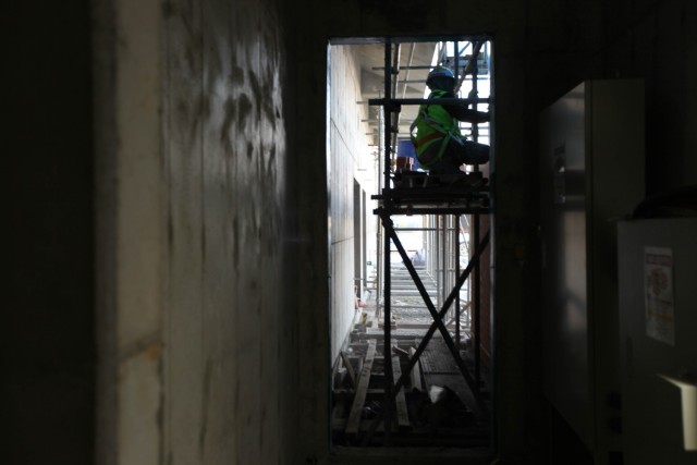 A construction worker works on a U.S. Army Corps of Engineers - Far East District barracks project on Camp Humphreys, South Korea. When complete, the over $140 million project will provide housing for over 900 servicemembers on the installation.