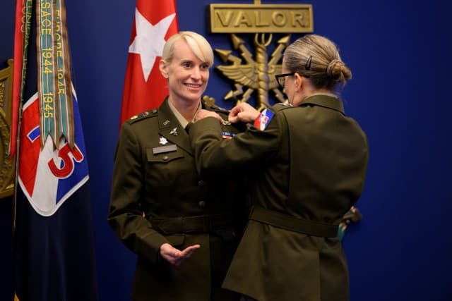 Maj. Gen. Michelle Link, 75th U.S. Army Reserve Innovation Command commander, presents the Basic Aviator Badge with the Astronaut Device to Maj. Kathleen Rubins, a NASA astronaut, during an awards ceremony at the Pentagon on Nov. 21, 2024. Rubins...