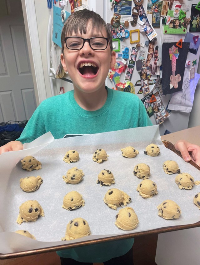 Colin Messenger, 13, son of Lt. Col. Tony Messenger, 3rd Squadron commander, Second Security Force Assistance Brigade, Fort Liberty, North Carolina, helps make FORGE cookies at Fort Jackson,  South Carolina, Oct. 17, 2023. Every Basic Combat...