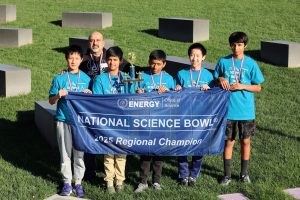 The 2025 California Regional Science Bowl Middle School competition winners from William Hopkins Middle School, from left to right, Andy Liu, coach Sachin Parekh, Avi Batra, Milan Nair, Lucas Jiang and Abhiraam Girish. (Photo courtesy of Sandia National Laboratories) Click on the thumbnail for a high-resolution image.